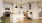 a kitchen with white cabinets